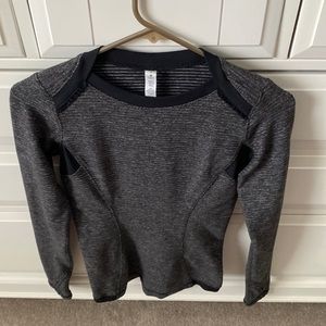 Lululemon long sleeve top, cute detail at neck , soft material .